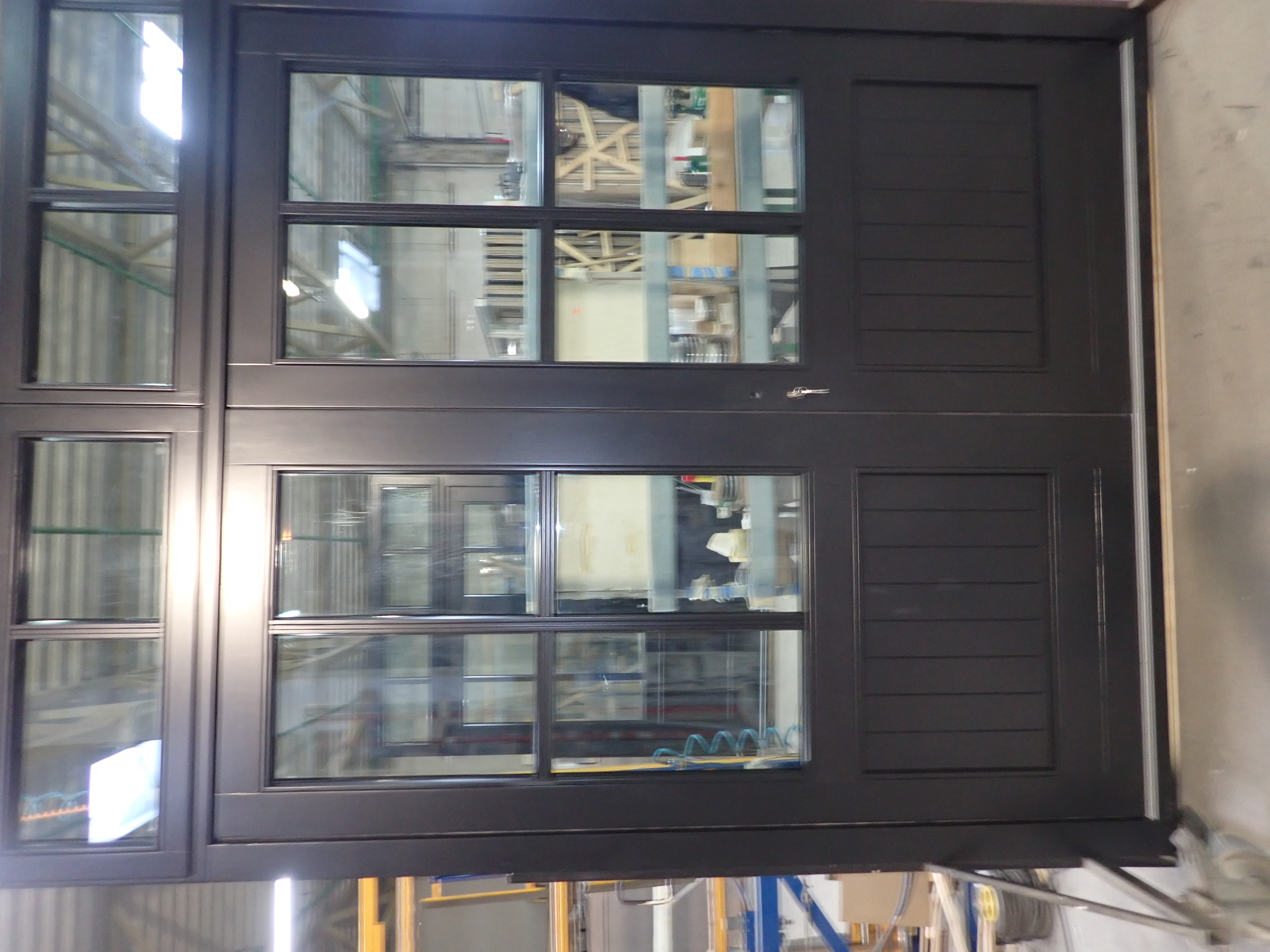 Project Roest Amsterdam, aluminium vliesgevel met deuren van vijf meter hoog